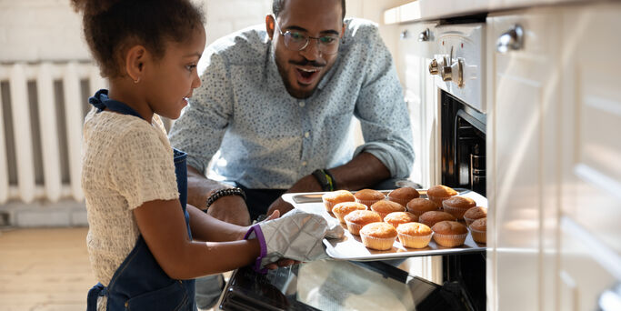 Dad and daughter cooking